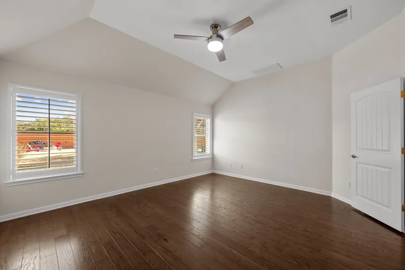 Bedroom before staging — empty room